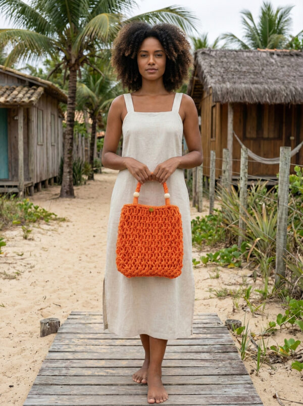 Bolsa Bahia artesanal em macramê cor laranja vibrante
